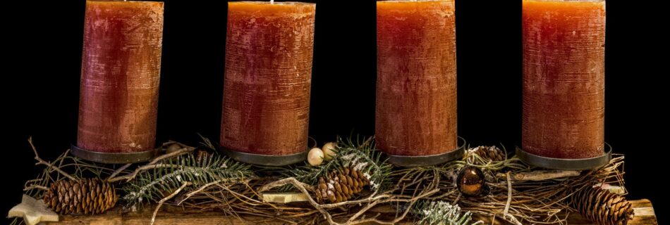 four brown wax candles